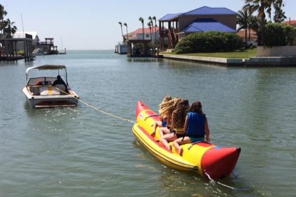 Banana boat rides in Laguna Madre Bay