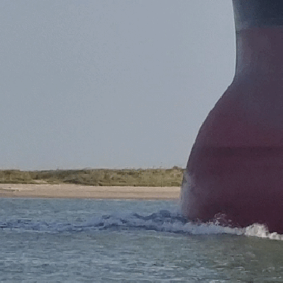 a small boat in a body of water