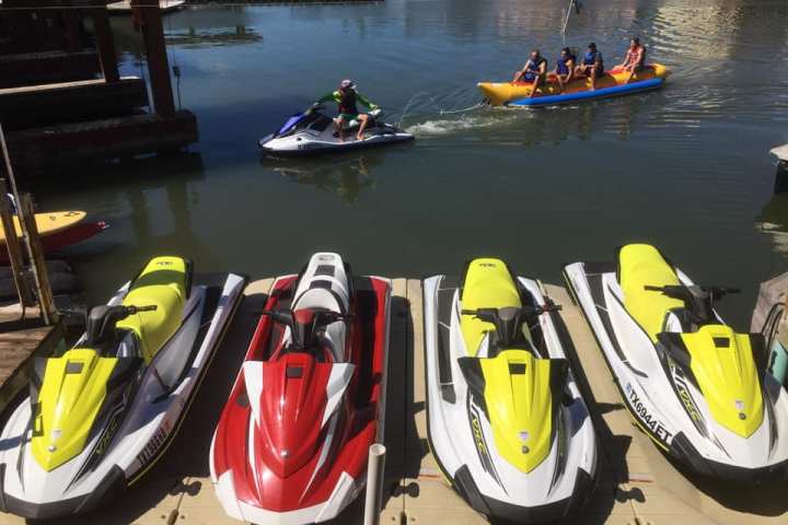 a group of people on a boat in a body of water
