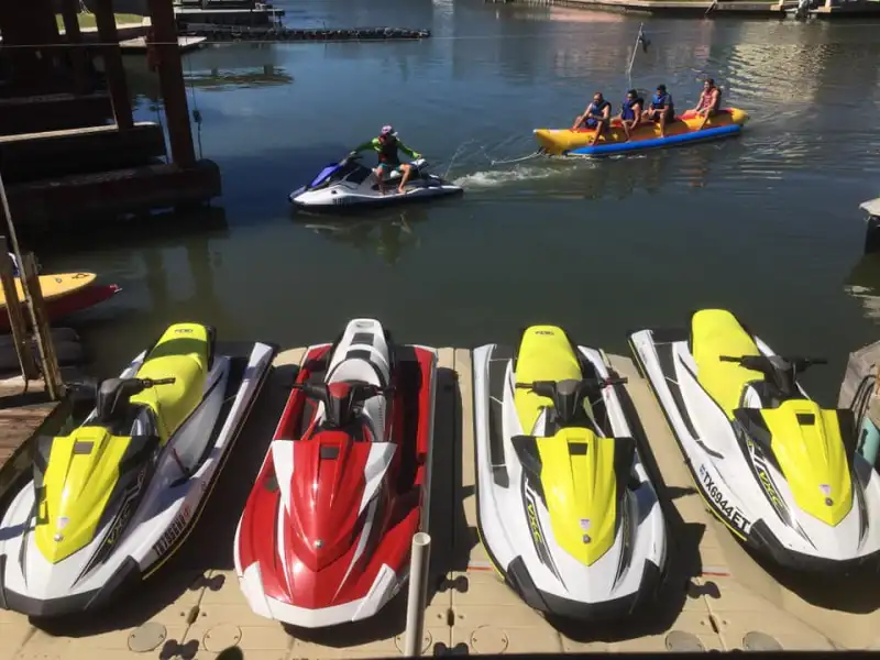 a group of people on a boat in a body of water