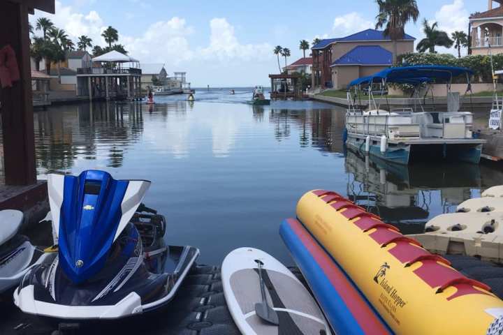 a boat is docked next to a body of water